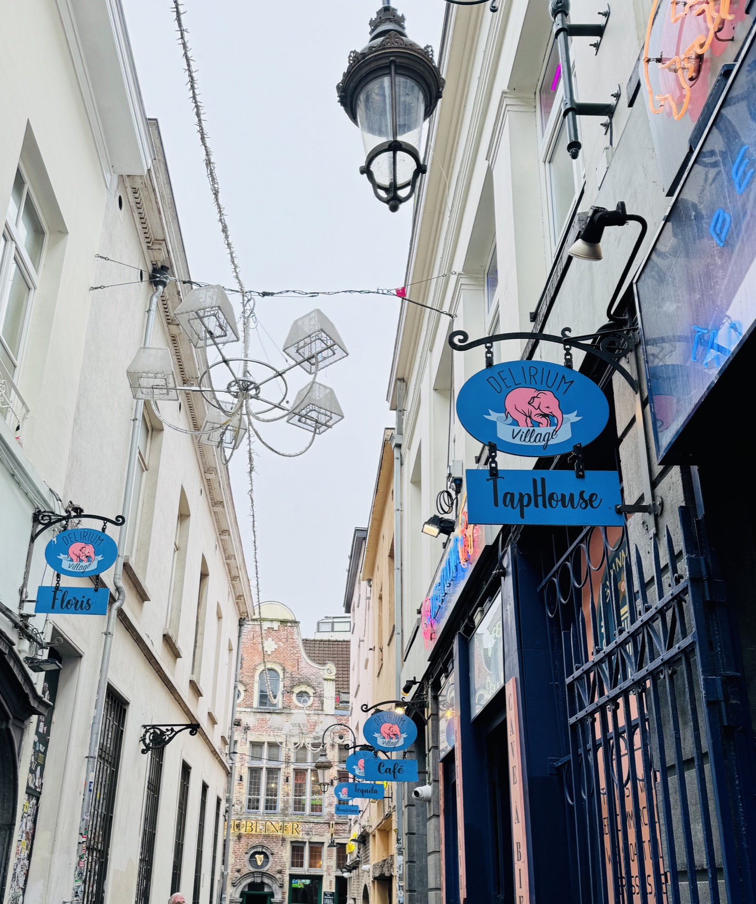 Signs for the different bars at Delirium Village in Brussels