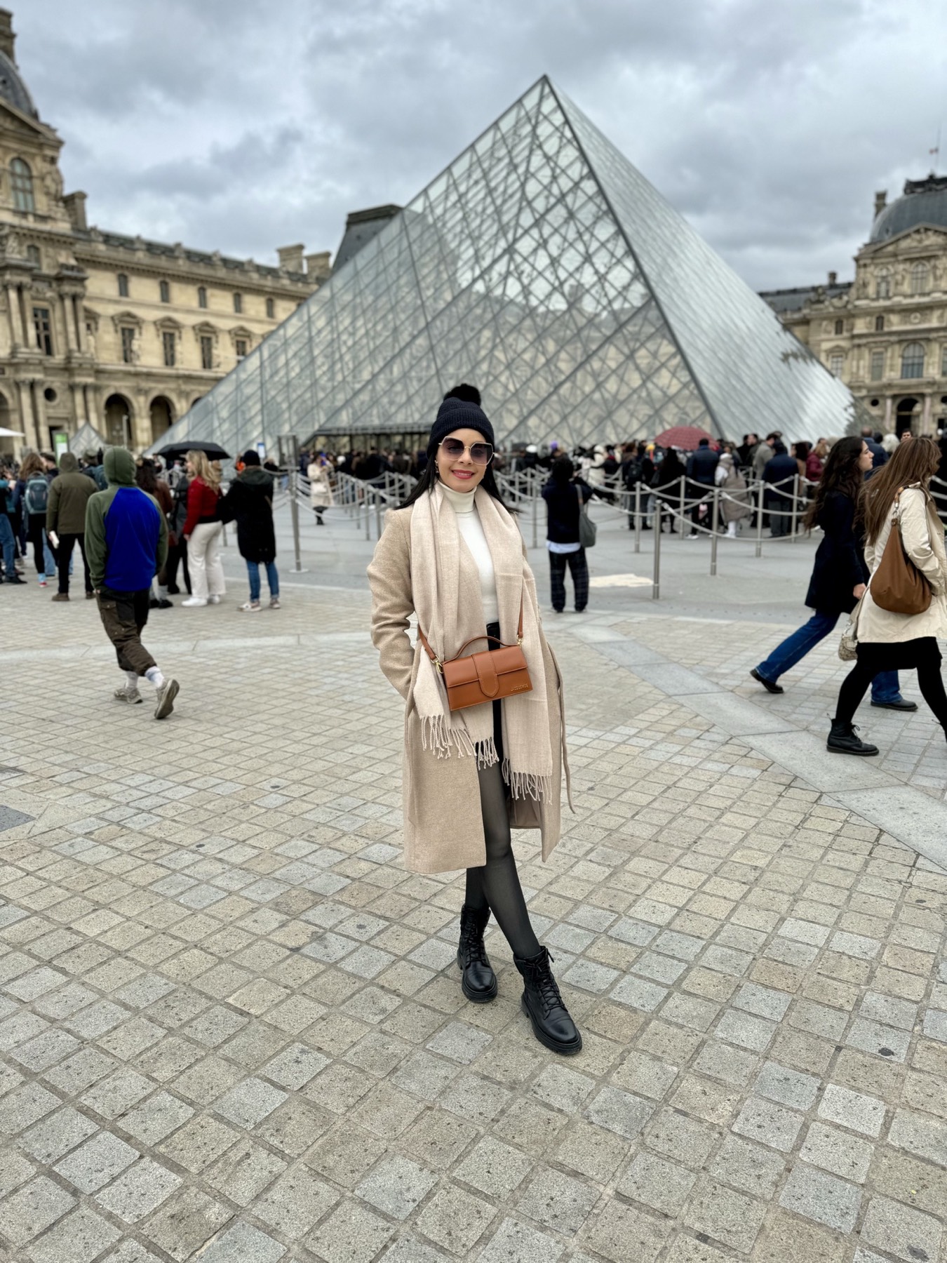 Eliza in front of the Louvre Pyramid