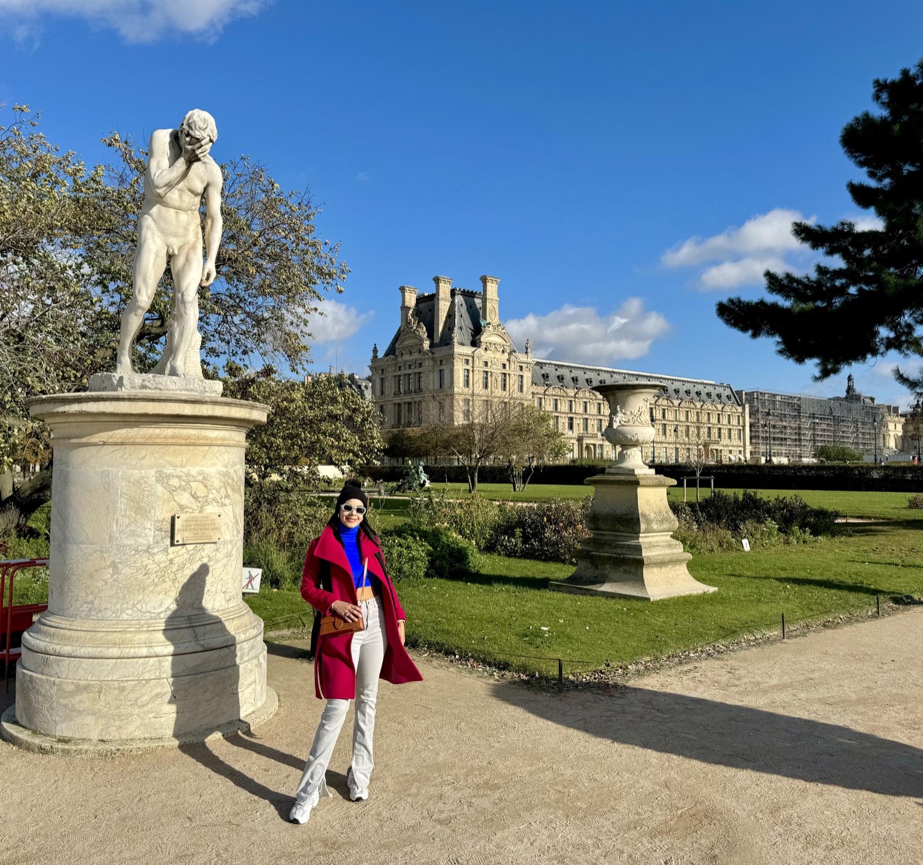 Eliza walking through the Jardin des Tuileries