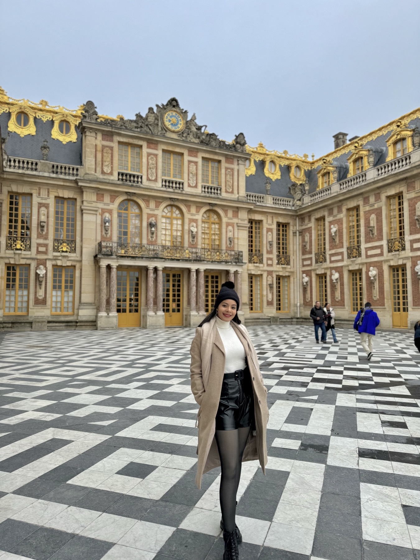 Eliza in the courtyard at the Palace of Versailles