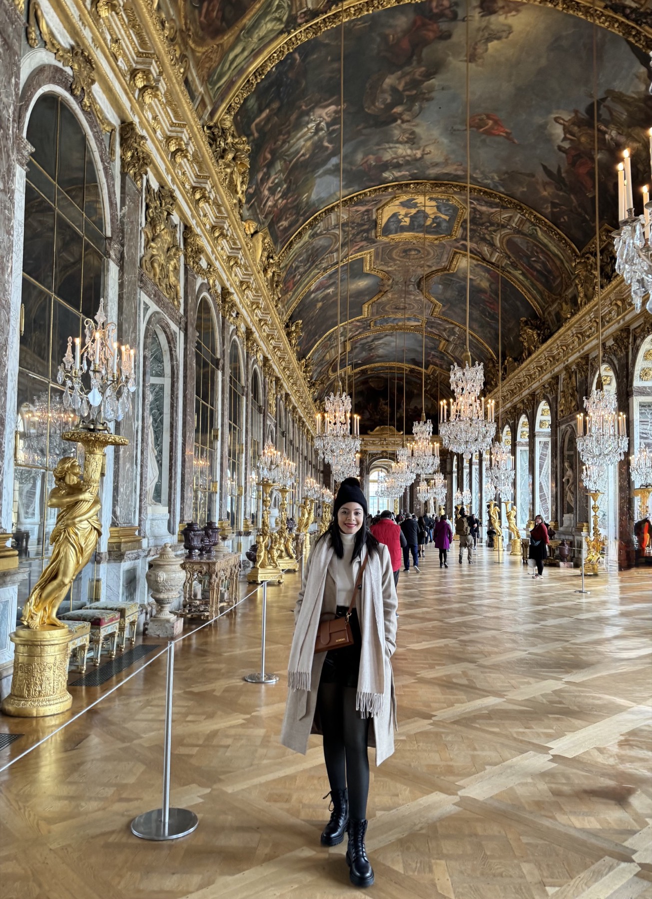 Eliza inside the Hall of Mirrors at Versailles