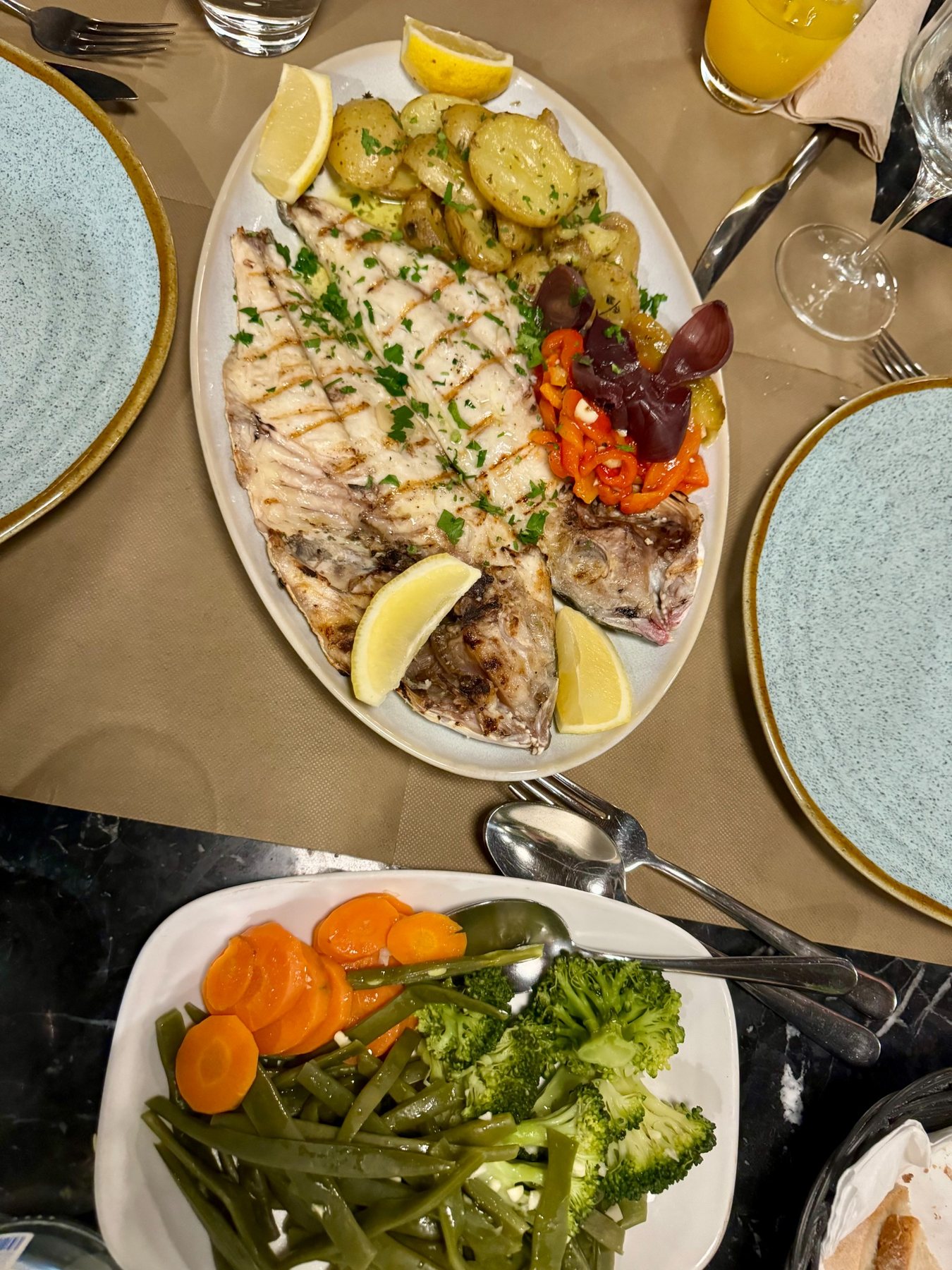 Grilled whole fish with vegetables