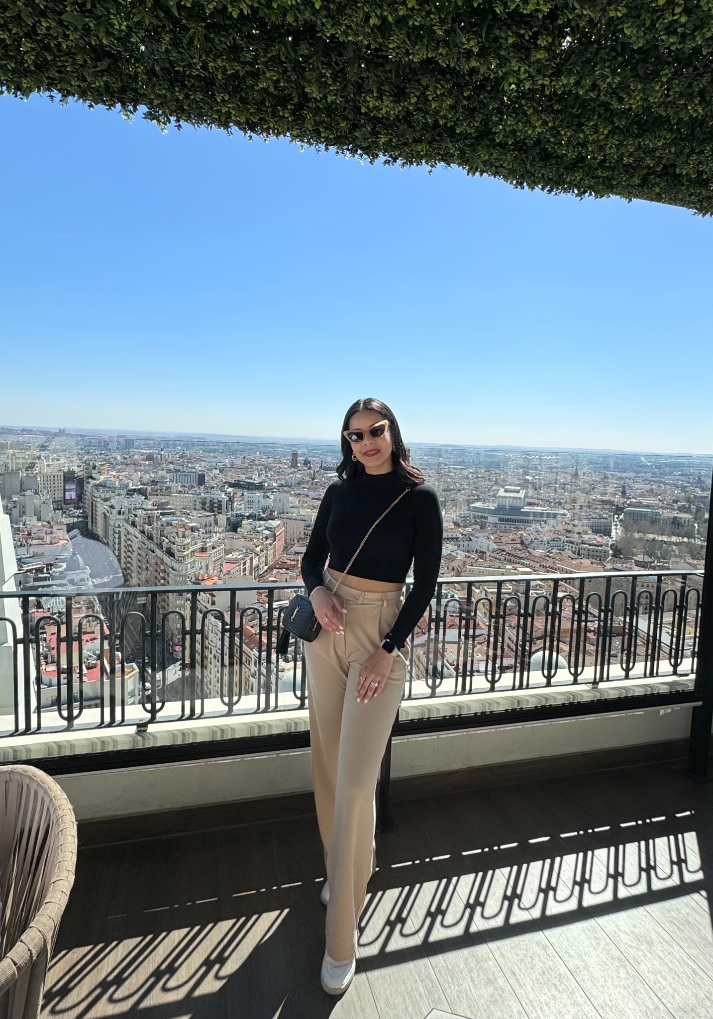 Eliza overlooking Madrid from a rooftop