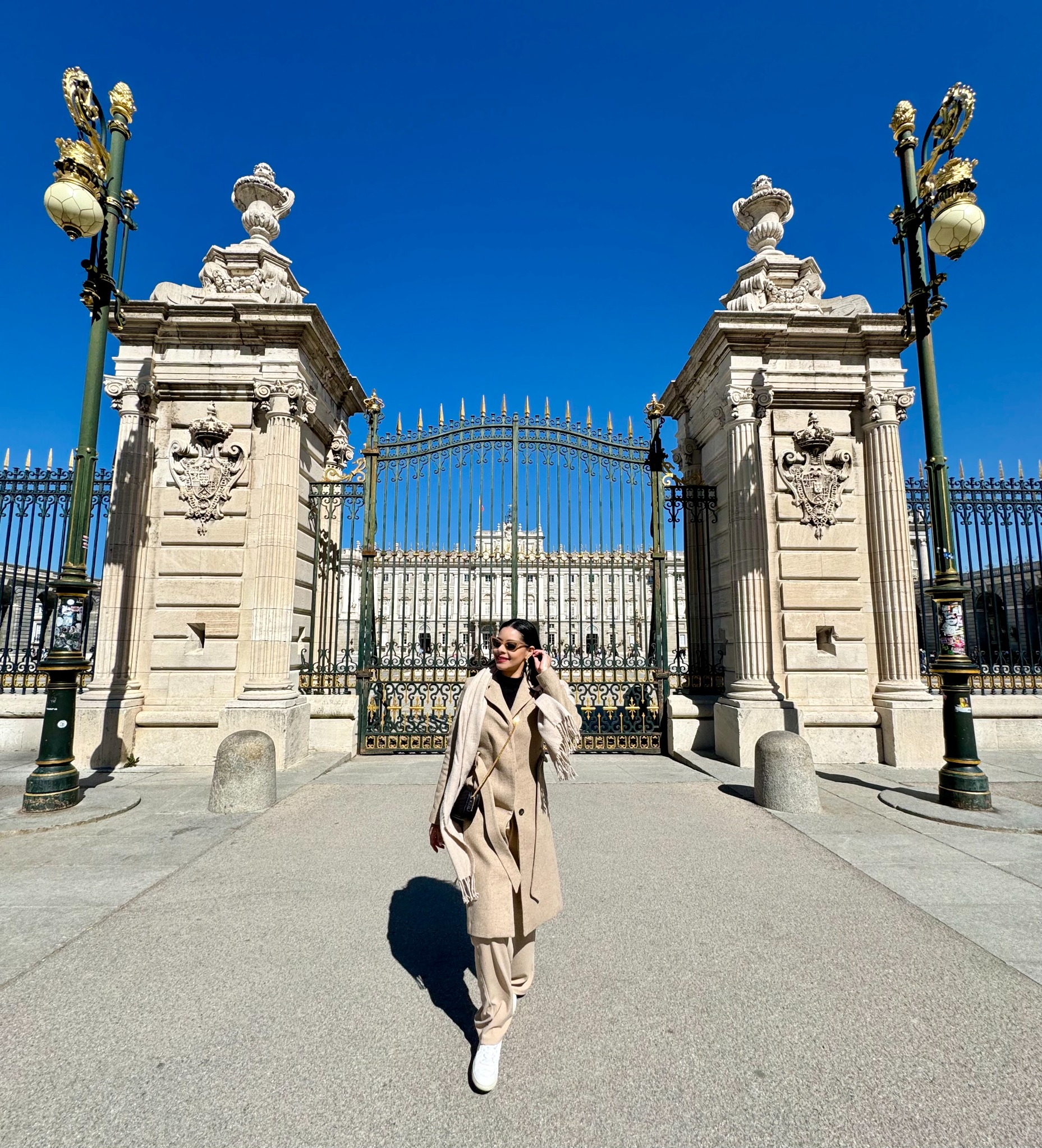 Eliza at the Royal Palace gates in Madrid